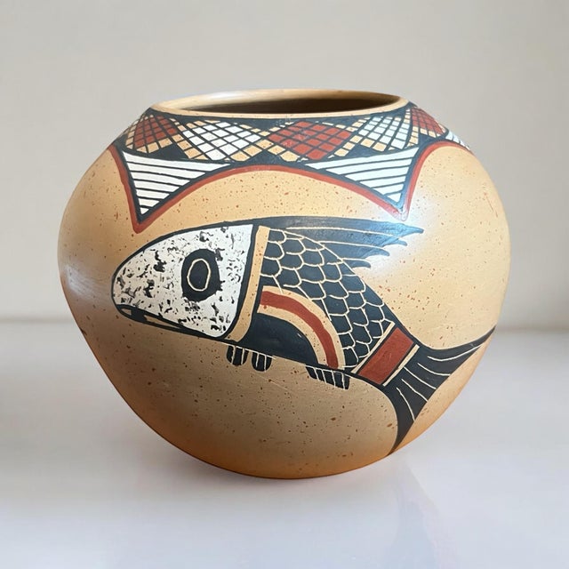 The walls on this piece of Mata Ortiz pottery are expertly thin. Mata Ortiz is a pottery style that references the ceramic...