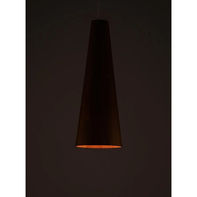 Jörgen Wolf Ceiling Lamp in Oregon Pine, 1960s. This piece is attributed to the mentioned designer/maker. It has no...