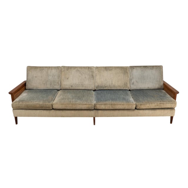 Fantastic 1960s Mid Century Modern sofa with a long 101 inch profile, walnut frame, and caned sides. The proportions are...