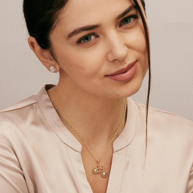 Created in 18 karat yellow gold Diamonds 0.20 carat approx. Chain sold separately Exquisitely crafted in 18k yellow gold,...