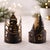 Bring woodland charm and modern elegance to your space with the Cut Metal Snowman and Forest Candle Holder Set. Featuring...