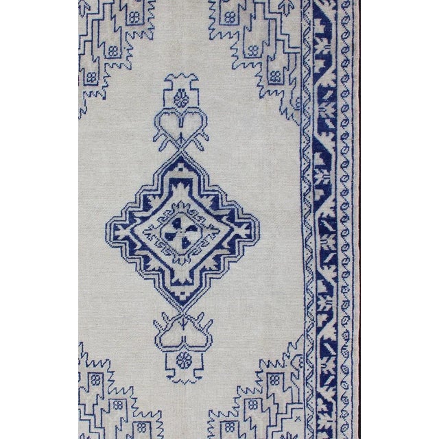 Measures: 3'2 x 5'7. Vintage Turkish Oushak Rug Featuring Deep Indigo and Ivory Geometric Medallion. Keivan Woven Arts /...