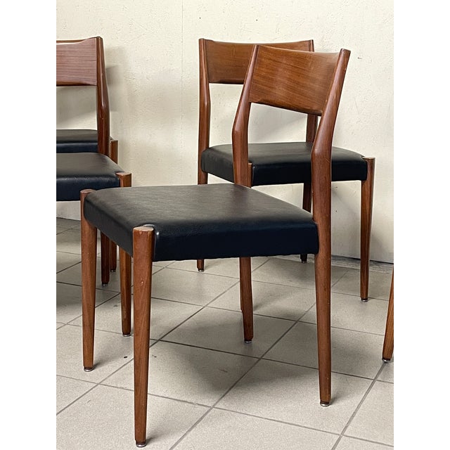 Set of 6 vintage Scandinavian chairs from the 1960s. The design is clean, linear, yet very interesting. Teak frame with...