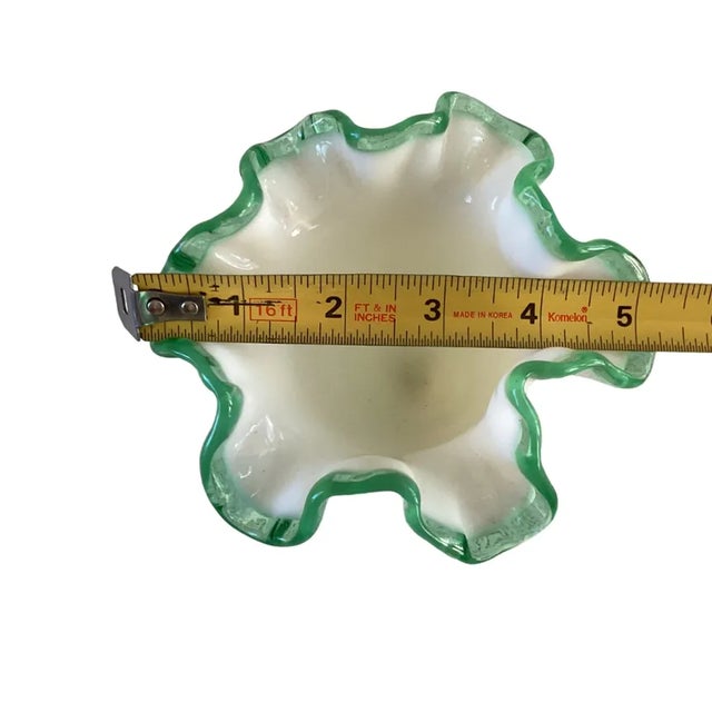 Vintage Fenton White Milk Glass Vase – Emerald Green Crest Rim, Crimped Ruffled Lip, Footed Base Bring a touch of vintage...