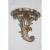 This stylish pair of Italian Louis XV style wall brackets are hand-carved wood with a silver leaf finish.