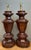 This striking pair of vintage faceted wood table lamps embodies the sculptural elegance of Mid-Century Modern design....