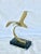 Fun vintage sculpture. Made of brass and stone. Features an abstract seagull. Perfect for display. Gives a coastal and...