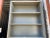 Vintage mid century modern tall metal bookshelf with adjustable shelves it has some screw wholes to secure the bookcase...