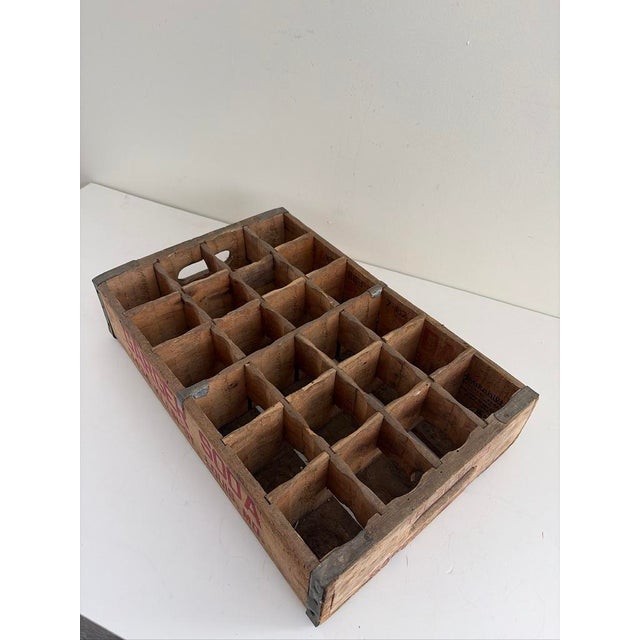 Date: Circa 1930s–1940s Origin: St. Louis, Missouri Material: Wood with metal corner brackets and original interior...