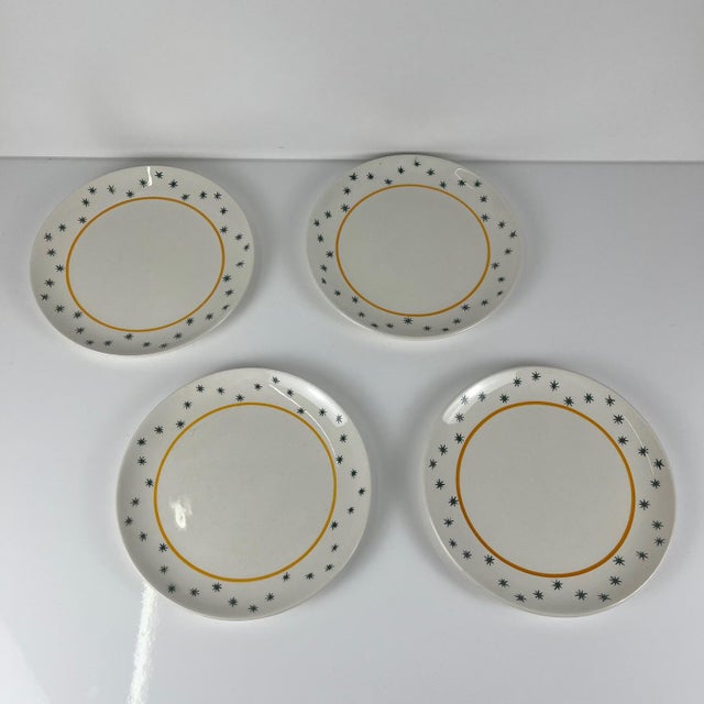 Set of 4 Gien dessert plates, Primefleur design, "Constellation" pattern, 1950 Green stars and orange rim on a white/cream...