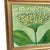 A quietly extraordinary original painting featuring an oversized allium flower rendered in soft yellow-green against a...