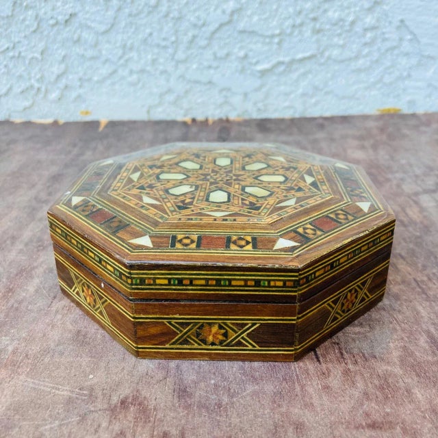 This is a beautiful Moroccan inlay marquetry jewelry box. This fabulous piece dates from the 1970s and is made from...