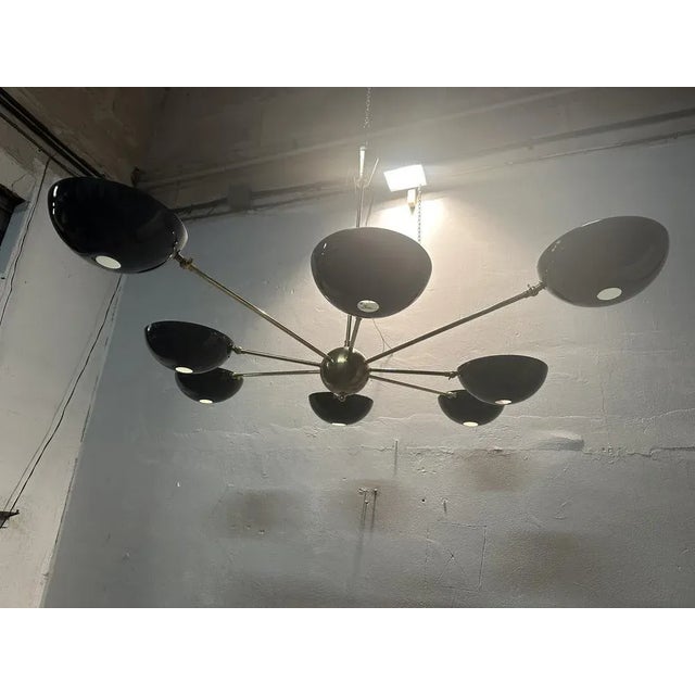 70s chandelier consisting of 8 domes that can be oriented individually Up to 250V (Europe/UK Standard).The wiring of this...
