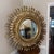 Bring iconic 1970s retro style into your home with this striking vintage sunburst wall mirror. Featuring a bold round...