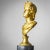 Gilded bust of Apollo Belvedere on a grey cylindrical plinth with black base. Plinth: 6.5 x 6.5 cm