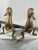 An exceptional and highly unusual pair of vintage mid-century modern sculptural fire dogs / andirons depicting stylized,...