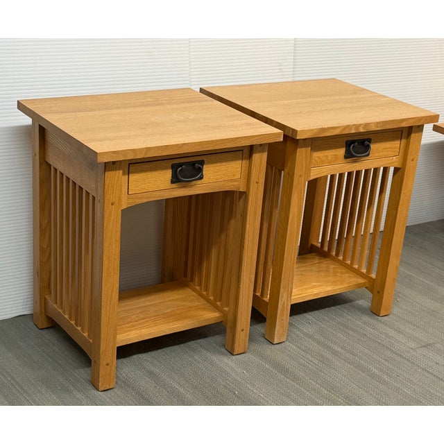 Design Plus Gallery presents a Pair of Mission Style Oak End Tables by Michael's Furniture Company. These tables showcase...