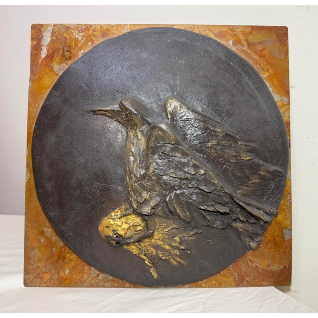 This vintage handmade gilt bronze "Raven Steals The Sun" relief wall plaque sculpture is a unique and stunning piece of...