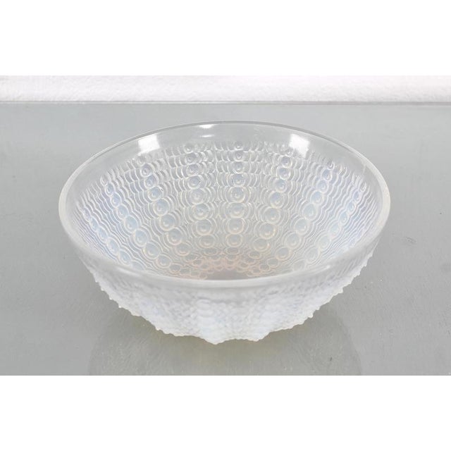 Prestigious "Oursins" No.2 opalescent crystal bowl with sea urchin motif, by René Lalique, designed in 1935. The model is...