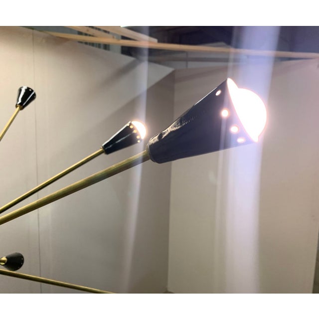 Stilnovo sputnik chandelier – italy, 1950s – 12 cones, restored : this iconic stilnovo sputnik chandelier, made in italy...