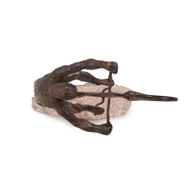 The Cyclist Sculpture The cyclist shows off the daredevil in all of us as he pops a wheely. Cast in resin and finished in...