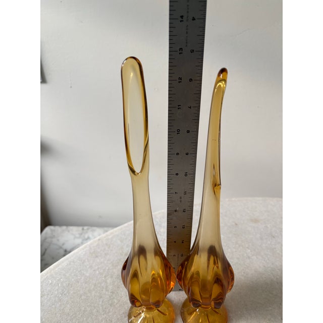 Lovely pair of mid-century, modern viking, amber glass swung vases.