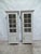 This is a set of 2 Gustavian Style display cabinets. They have been restored and repainted with Milk Paints Oyster White..