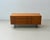 Elegant mid-century sideboard/lowboard with a clean, minimalist design. The piece impresses with its warm teak veneer,...