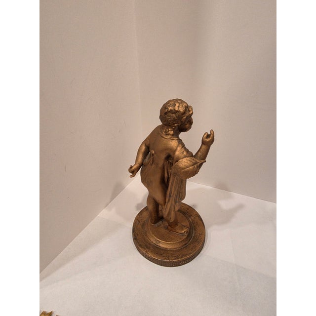 Originally this was a figural silver plate item. Now it has a distressed gold patina that looks amazing. This would look...