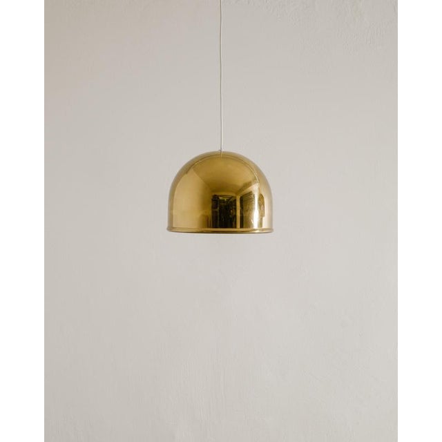 Rare pair of Swedish mid century ceiling pendant lamps in patinated brass by Eje Ahlgren for Bergboms Sweden, 1960s In...