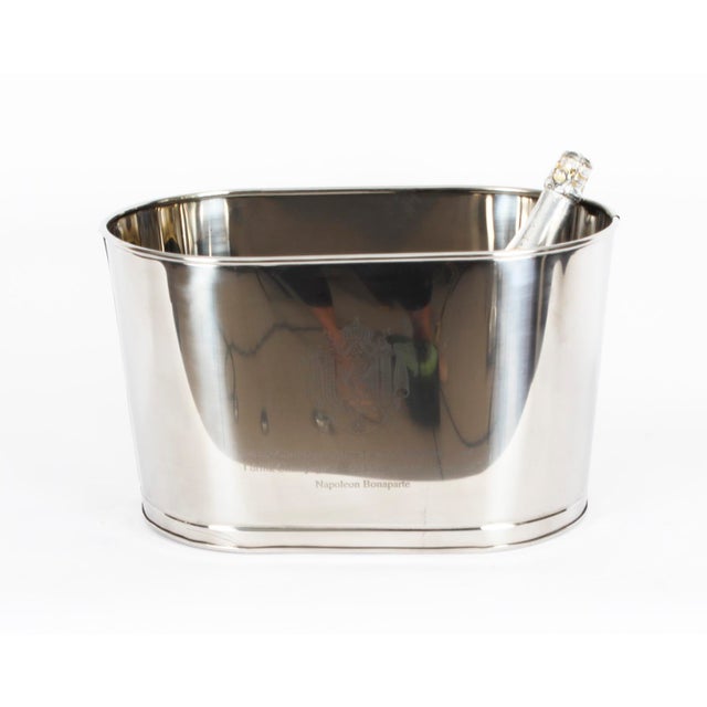 This is an elegant vintage silver plated champagne cooler, dating from the late 20th century. this alluring item is...