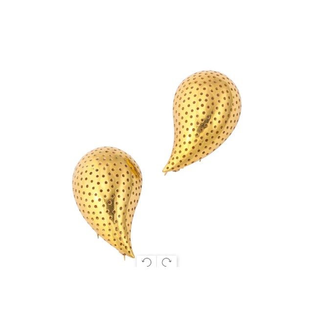 Pair of 18 kt Gold Clips. Made in Italy and retailed by Tiffany and Co. Teardrop Shape with symmetrical engraved dots....