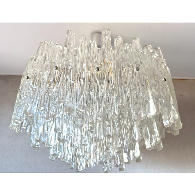 Beautiful Mid - Century Design. 1970s large chandelier made of high quality acrylic glass. Steel frame with in 4 steps ice...