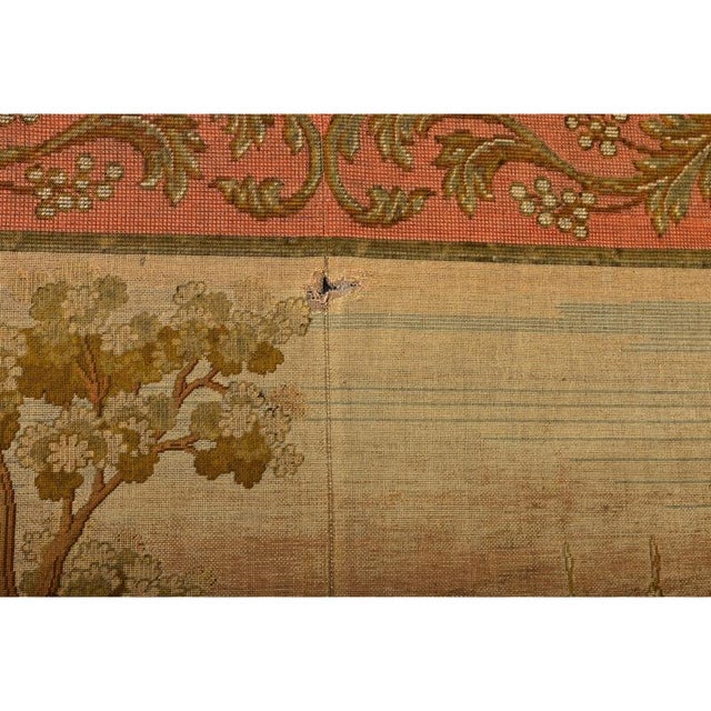 Dimensions: 79 ⅝” H x 58 ¾” W x 1 ⅛” D A charming French 19th century Verdure-style tapestry depicting a lush, pastoral...