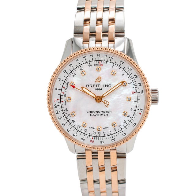 Brand: Breitling Gender: Ladies Metal Type: Stainless Steel & 18K Rose Gold Length: 7.25 inches Diameter: 35.00 mm Weight:...