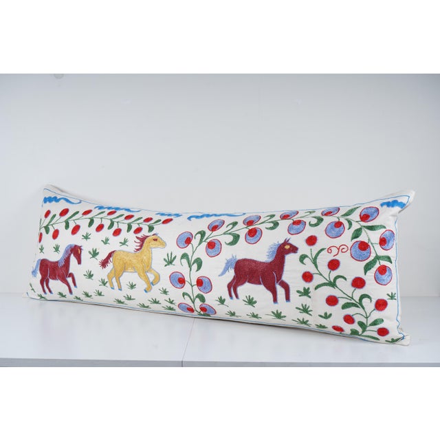 Uzbek Suzani Pillow Cover Elevate your home decor with our Turkish Suzani Pillow Cover, featuring exquisite vintage Uzbek...