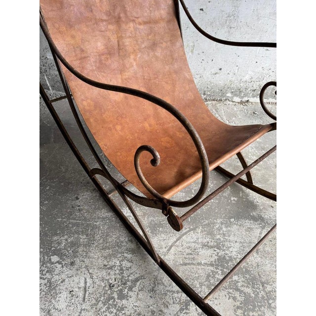 19th century metal rocking chair with leather seat unique antique rocking chair from the 19th century, made of forged...
