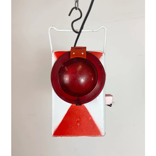 Vintage Industrial railway lantern made by Kovo Věšín in former Czechoslovakia during the 1980s. It features a red-white...