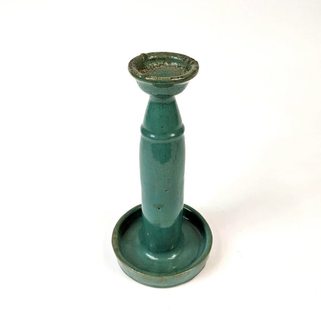 This Chinese oil lamp is from the 19th century and considered Shiwan ware. Shiwan ware is Chinese pottery from the...