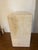 Great beige travertine plinth pedestal table. It is a postmodern style stand often used to display sculptures, plants, or...