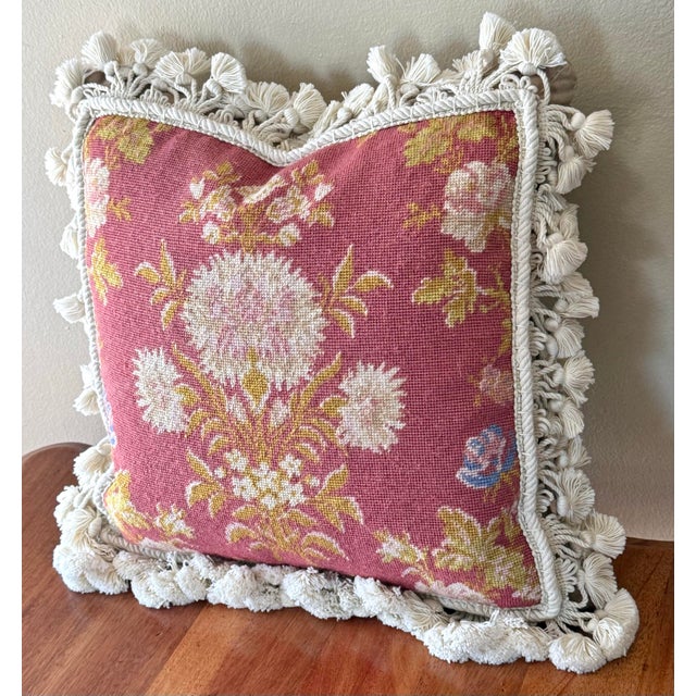 Vintage French Aubusson style needlepoint pillow is embellished with tassel fringe, velvet backing and zipper closure....