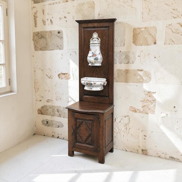 Evocative of everyday life in the French countryside during the 19th century, this remarkable Country French lavabo...