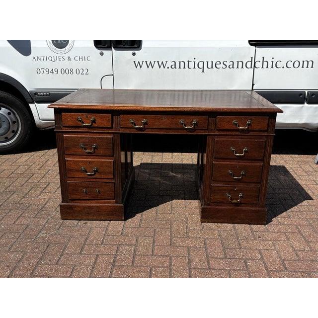 Edwardian Oak Twin Pedestal Desk. Strong & Solid. Splits into 3 pieces for easier transportation This is an old piece and...