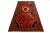 This Vintage all-over Designed wool rug has a field in red and navy blue. This piece has multicolor accents. This rug...