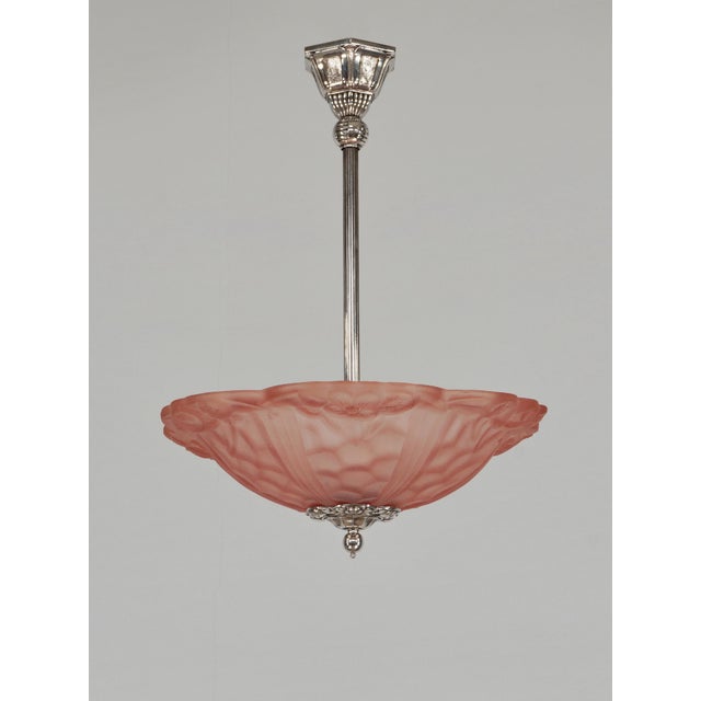 Degué A signed French art deco chandelier made around 1930 in nickel plated bronze or solid brass. The mounting holds a...