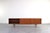 A long teak sideboard designed in the spirit of Scandinavian modernism combines functionality with a balanced, timeless...