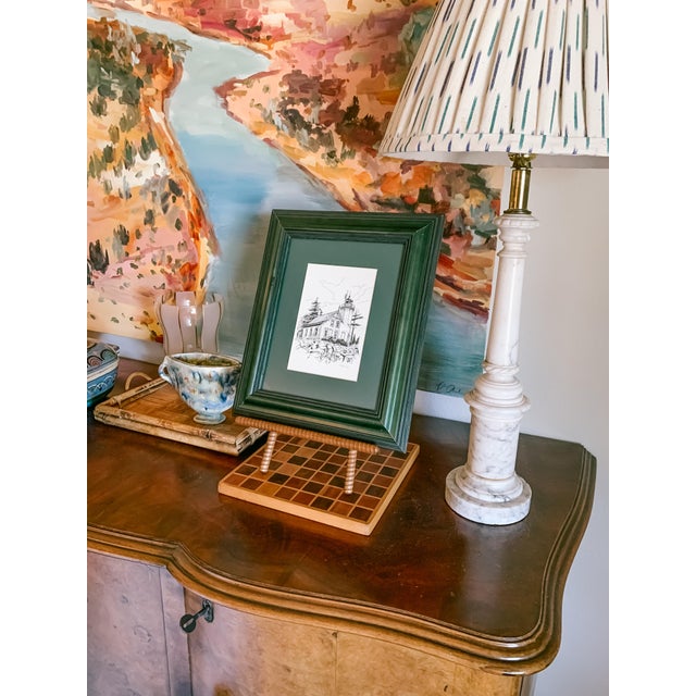 This little framed print is so sweet. It depicts the Eagle Bluff Lighthouse in Door County, Wisconsin, by artist Phillip...