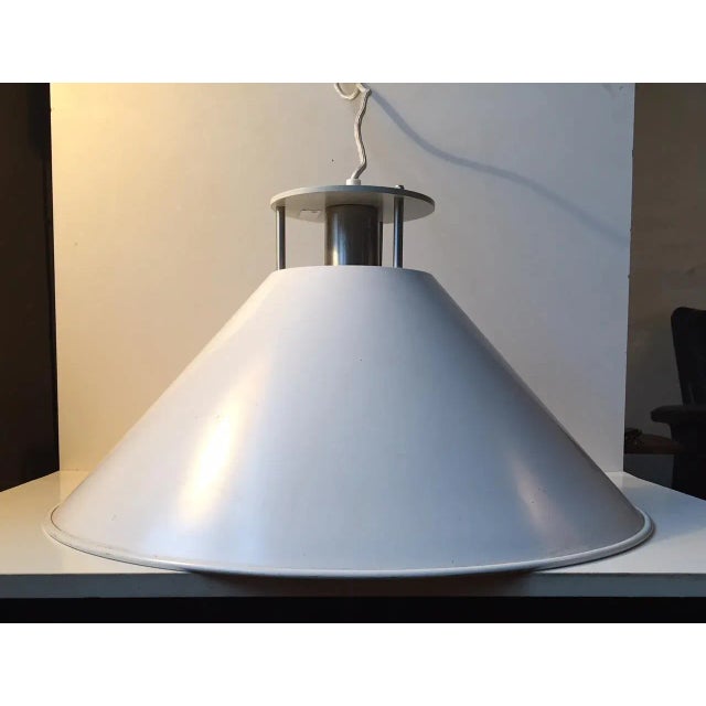 This is the large version of CF. Møllers industrial pendant and was manufactured by Nordisk Solar, Denmark, in the late...