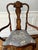 19th century Dutch Marquetry Armchair. Fine scalloped crest rail over a shaped seat. Newly reupholstered seat over...