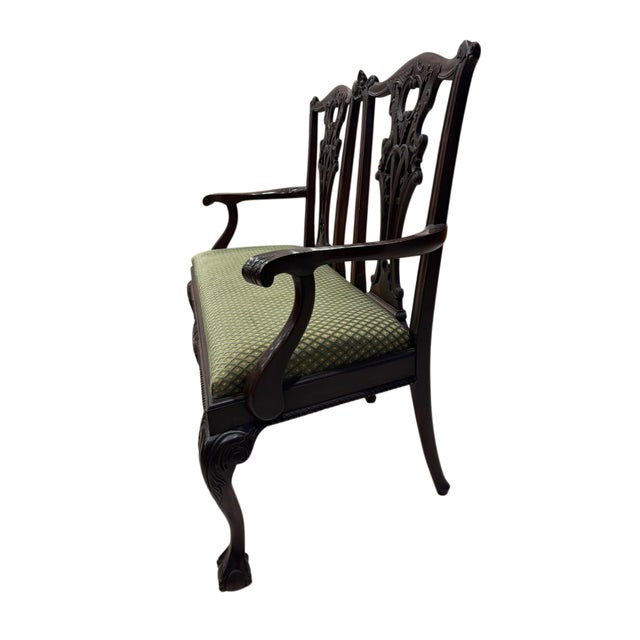 Elegant and finely crafted, this English Chippendale style window bench features beautifully carved openwork back splats,...
